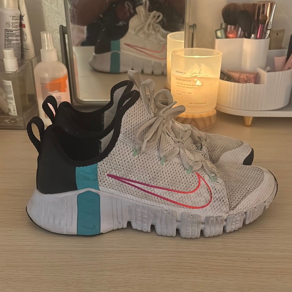 Nike White and Teal Metcon 4 with Pink Swoosh